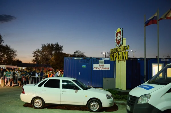 Unloading vehicles on the ferry in the port of Crimea