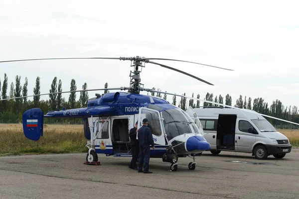 Police helicopter KA-226 at the airport.