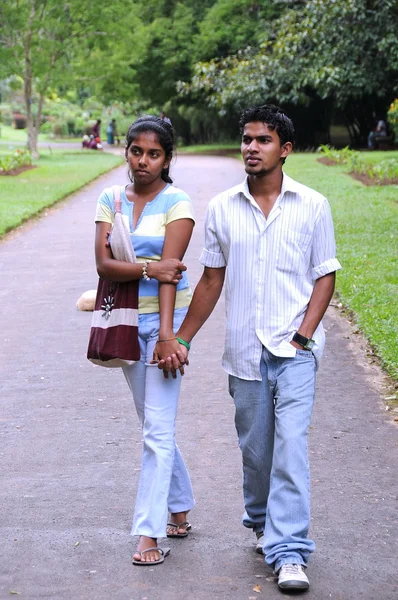 Unique Royal Botanical gardens in Peradeniya is considered as one of the best in Asia. Tourists on vacation in the Park.