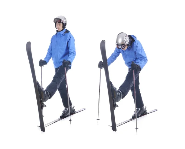 Skiier demonstrate warm up exercise for skiing. Pull up skis, bend forward and stretch.