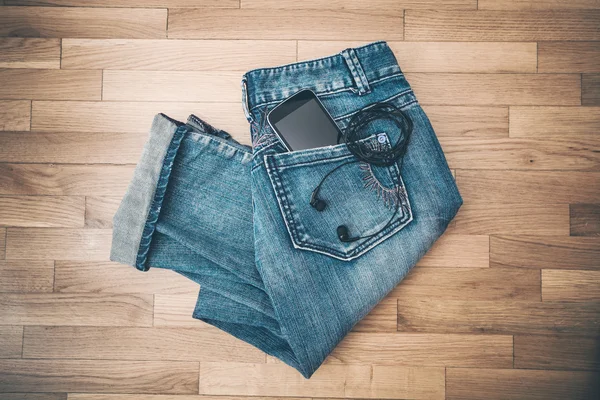 Jeans smart phone and earphones