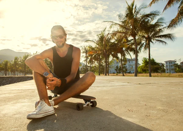 Guy skateboard at sunset