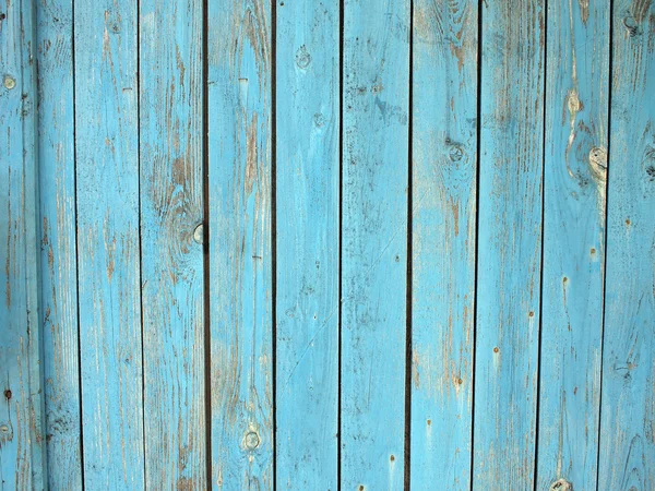 Old wooden planks with a shabby blue paint