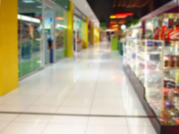 Blurred image of the hall in a large shopping mall