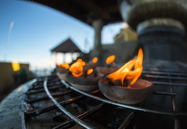 Candles burning in the temple