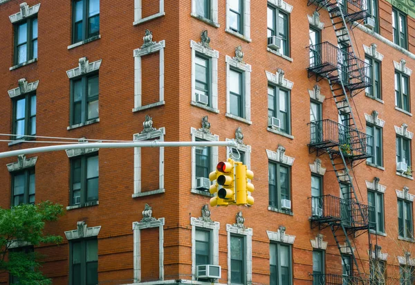 Building facade and traffic light in New York City