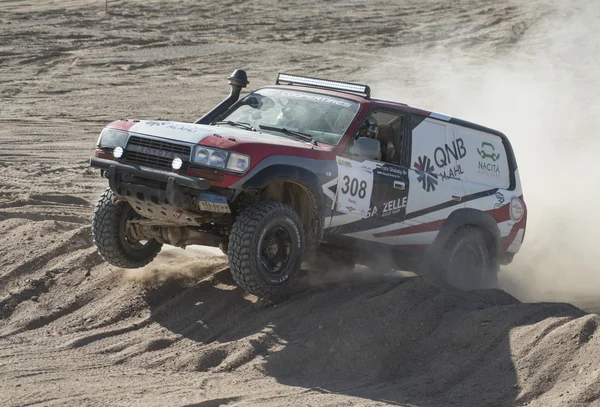 Off-road truck competing in a desert rally