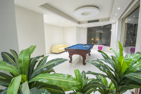 Interior of a games room with billiards pool table