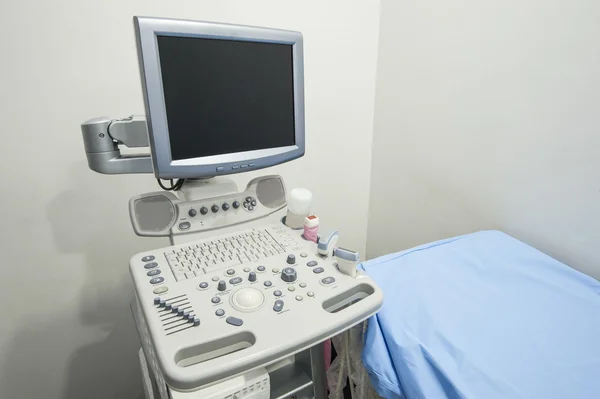 Examination bed and ultrasound scanner