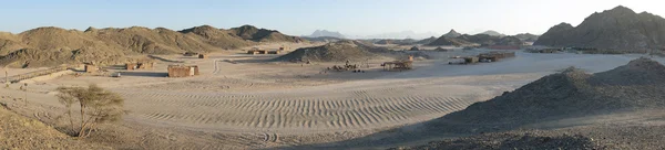 Rocky desert landscape with mountains