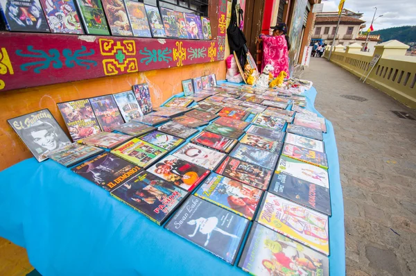 Cuenca, Ecuador - April 22, 2015: Selection of musical cd and dvd discs at local street vendor business