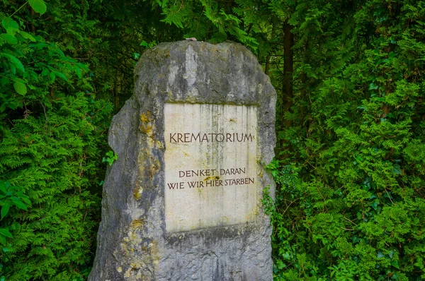 Dachau, Germany - July 30, 2015: A stone sign with the word Krematorium written on it, shameful reminder of what happened at concentration camp