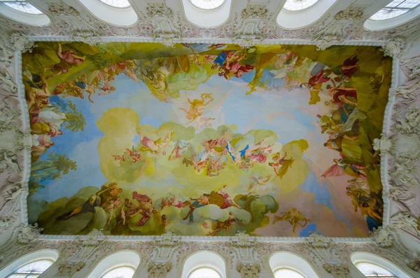 Schleissheim, Germany - July 30, 2015: Fresco painted ceiling inside palace revealing stunning artistic details and beauty, typical old european decorations