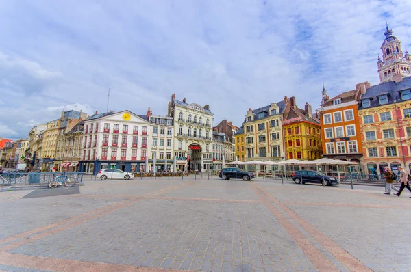 Lille, France - June 3, 2015: Beautiful Place Grande with its charming buildings and traditional european architecture sorrounding the plaza on a nice summer day