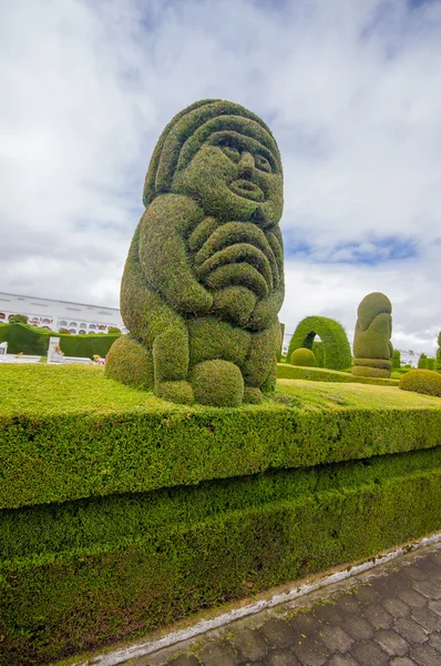 TULCAN, ECUADOR - JULY 3, 2016: incain sculpture in the garden of the cemetery