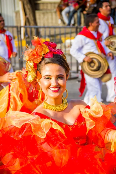 Performers with colorful and elaborate costumes participate in Colombias most important folklore celebration, the Carnival of Barranquilla, Colombia