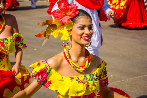 Performers with colorful and elaborate costumes participate in Colombias most important folklore celebration, the Carnival of Barranquilla, Colombia