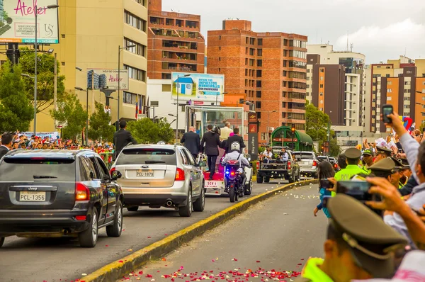 Pope Francis motorcade driving through city crowds of people cheering to start off official South America tour his first stop Quito, Ecuador, shot from behind vehicle