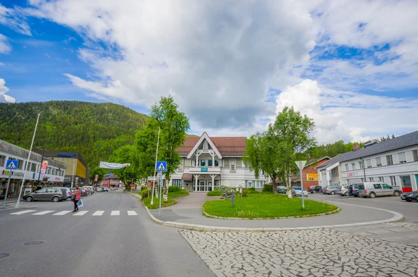 VALDRES, NORWAY - 6 JULY, 2015: Charming town of Fagernes with small city buildings sorrounded by green mountains