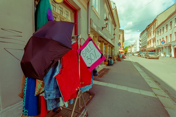 OSLO, NORWAY - 8 JULY, 2015: Sale outside local boutique store in charming neighbourhood Grunerlokka
