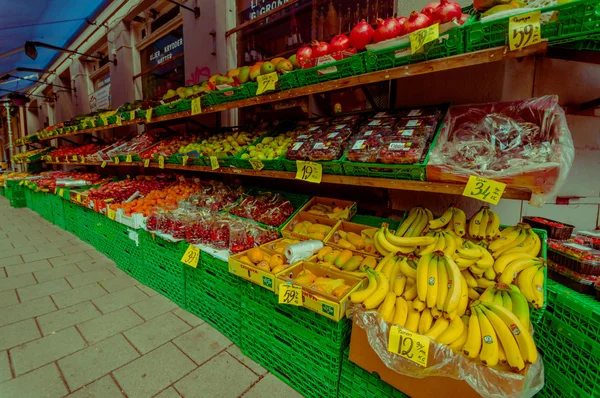 OSLO, NORWAY - 8 JULY, 2015: Typical vegetable market in Torggata where many immigrants run successfull food related businesses with a great variety of products