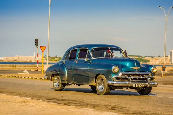 HAVANA, CUBA - AUGUST 30, 2015: Old classic American cars used for taxi and tourist transportation.