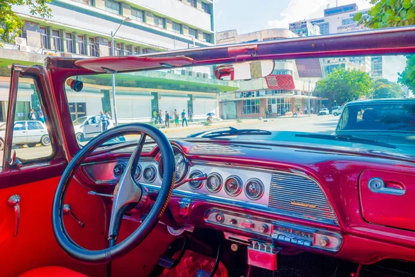 HAVANA, CUBA - AUGUST 30, 2015: Old classic American cars used for taxi and tourist transportation.