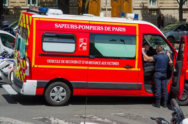 PARIS, FRANCE - JUNE 1: Fire car on the street of Paris downtown.