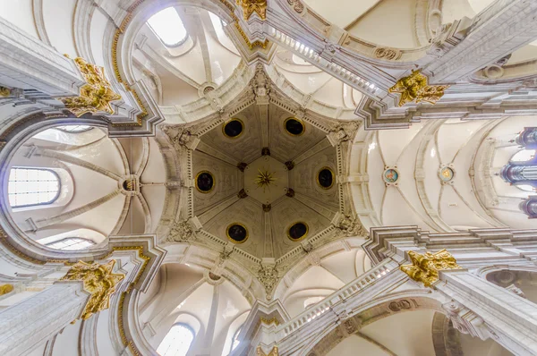 BRUSSELS, BELGIUM - 11 AUGUST, 2015: Inside famous Our Lady of Assistance Church, showing beautiful white ceiling with golden decorative details