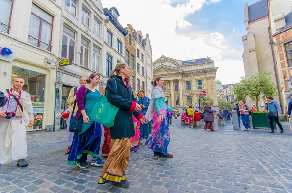 BRUSSELS, BELGIUM - 11 AUGUST, 2015: Hare Krishna street performers dancing in city centre