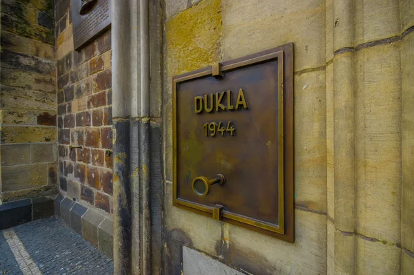 Prague, Czech Republic - 13 August, 2015: Metal plaque with writing, found on the buildings around old town square