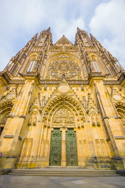 Prague, Czech Republic - 13 August, 2015: St. Vitus cathedral as seen from front with incredible details and gothic architecture