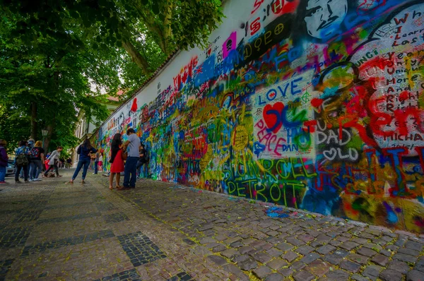 Prague, Czech Republic - 13 August, 2015: Famous John Lennon wall filled up with love inspired graffiti in city centre