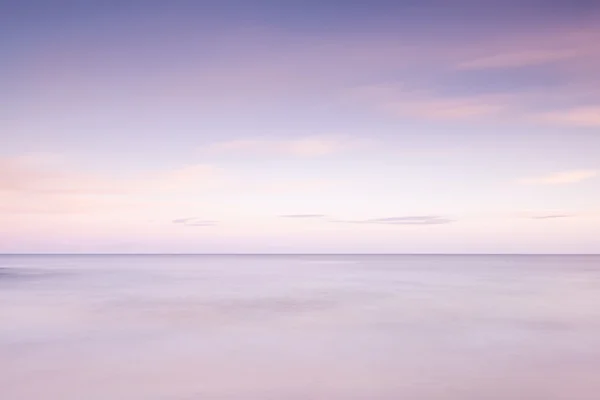 Calmness in pink and blue at ocean