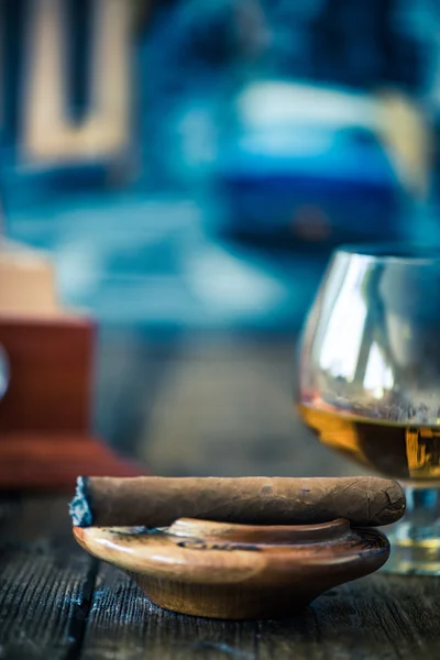 Cuban cigar and glass of rum or cognac