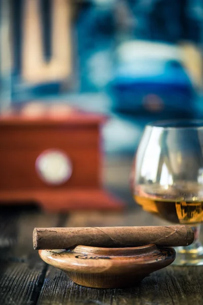 Cuban cigar and glass of rum or cognac