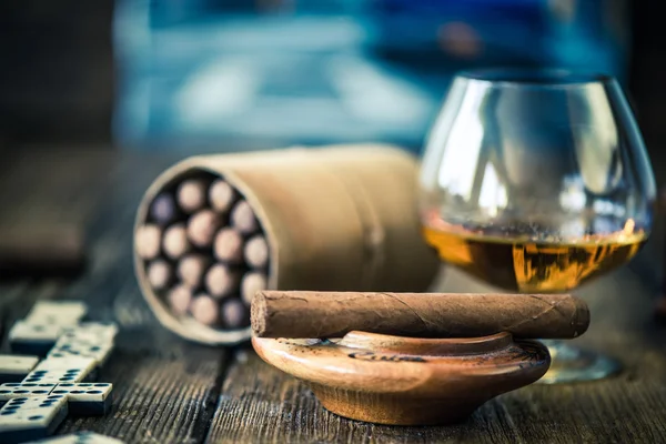 Cuban cigar and glass of rum or cognac