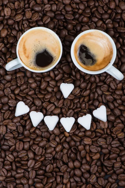 Funny smile face made of expresso coffee, sugar and roasted bean