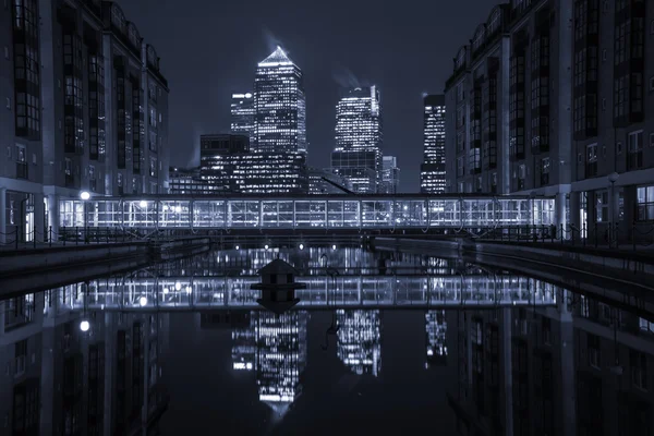 London modern finance district in downtown iluminated at night.