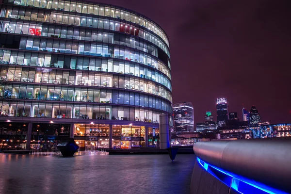 London modern finance district in downtown iluminated at night.