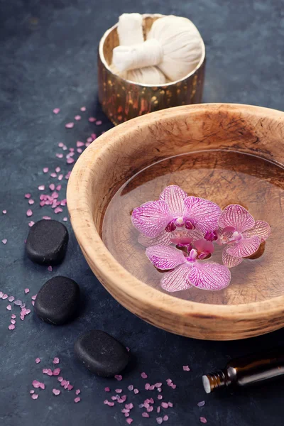 Spa background with orchids and stones zen