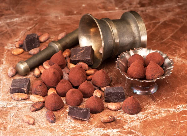 Chocolate truffles, chocolate and cacao beans