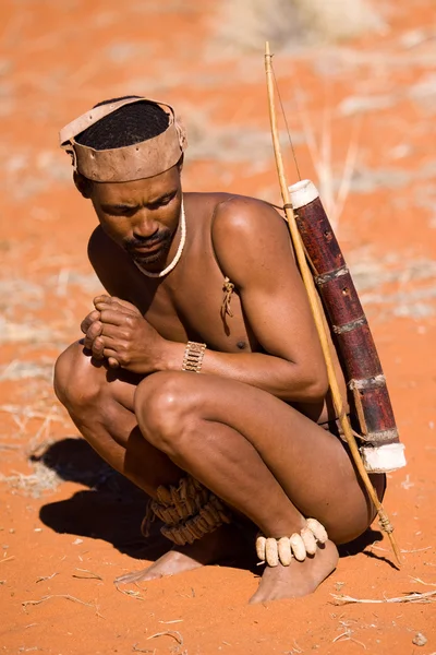 San man in native settlement