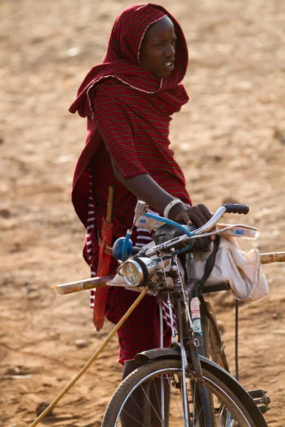 Masai tribal man with bike
