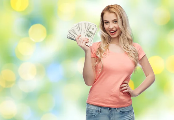 Happy young woman with usa dollar cash money
