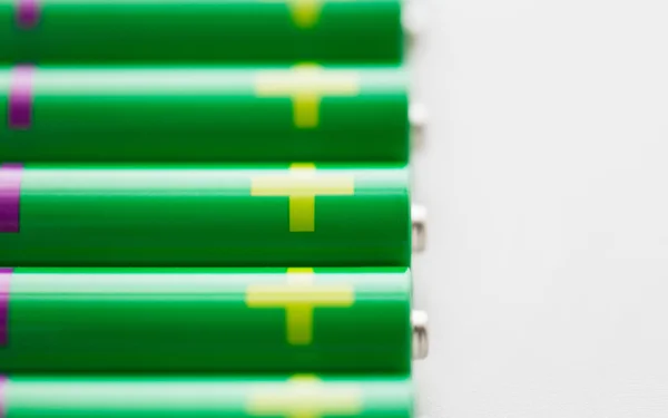 Close up of green alkaline batteries