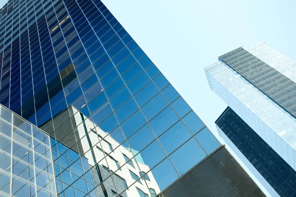 Close up of office building or skyscraper and sky