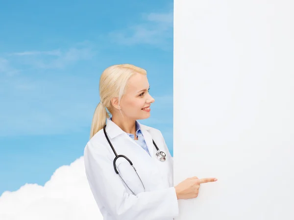 Smiling female doctor with stethoscope