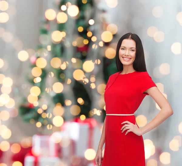 Smiling woman in red dress