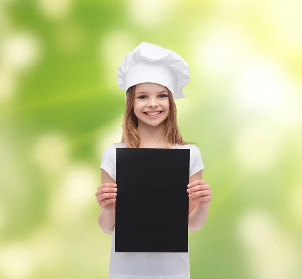 Little cook or baker with blank black paper